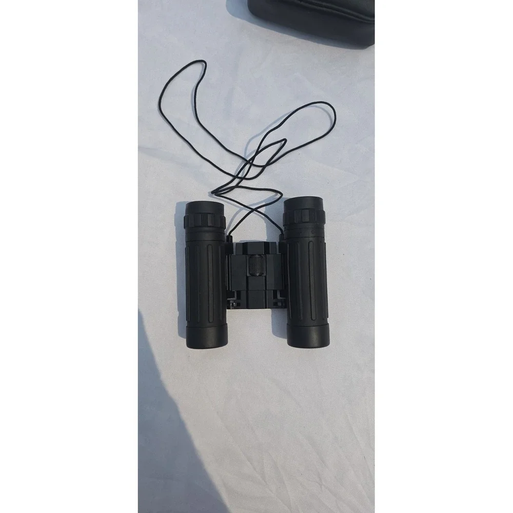 Tasco 10x25 compact binoculars With Case